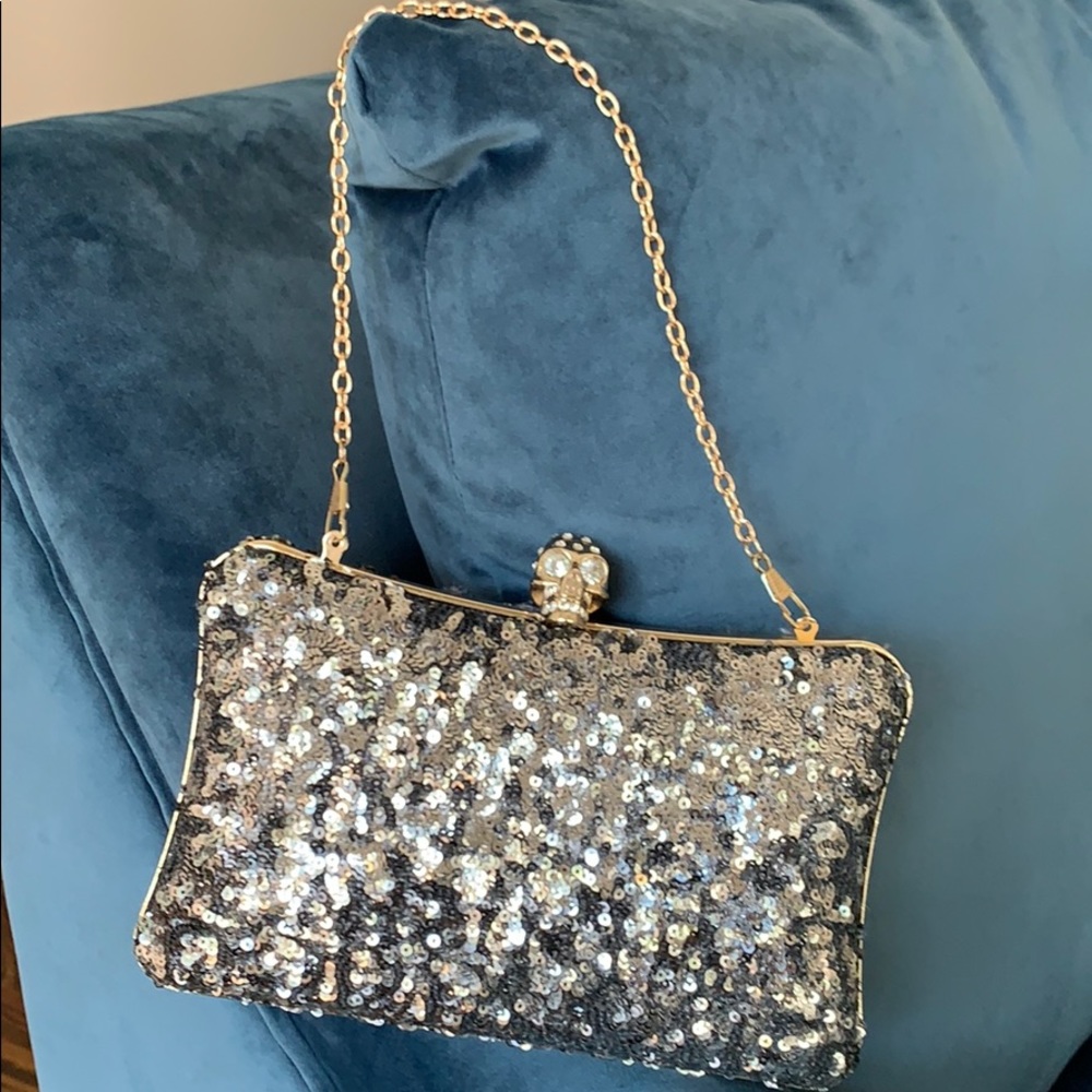 Gorgeous sequin clutch/bag with skull clasp